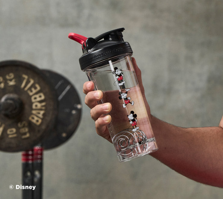 pro-series-t0 Mickey_Mouse_Protein_Shaker_Bottle_Being_Held_In_the_Gym.jpg